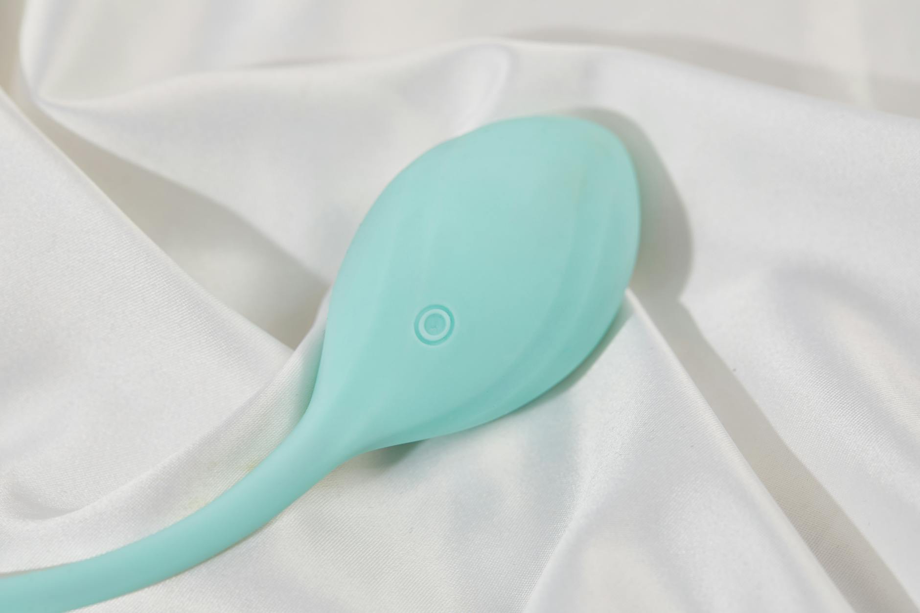 Two bright lemons on a minimalist white background, symbolizing the gentle design of lemon-shaped clitoral toys